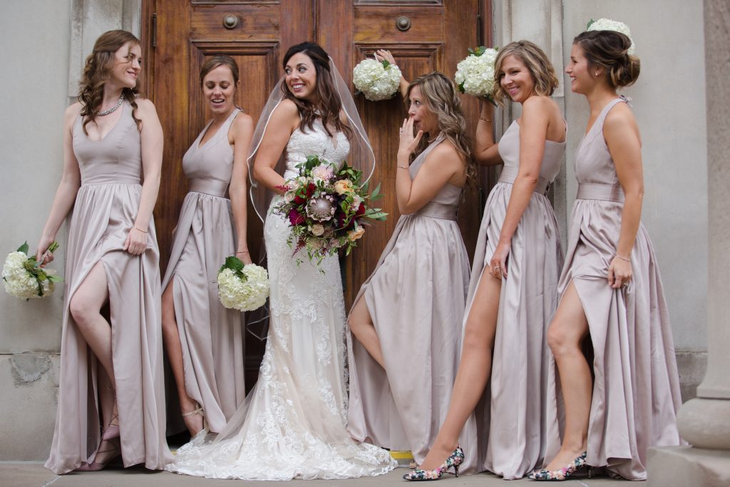 bridesmaids in front of church door