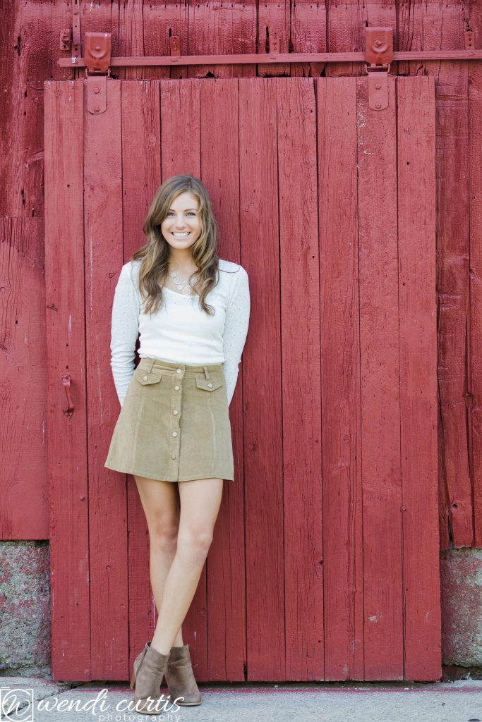 senior girl red barn