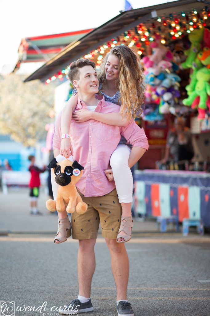 engagement session at carnival